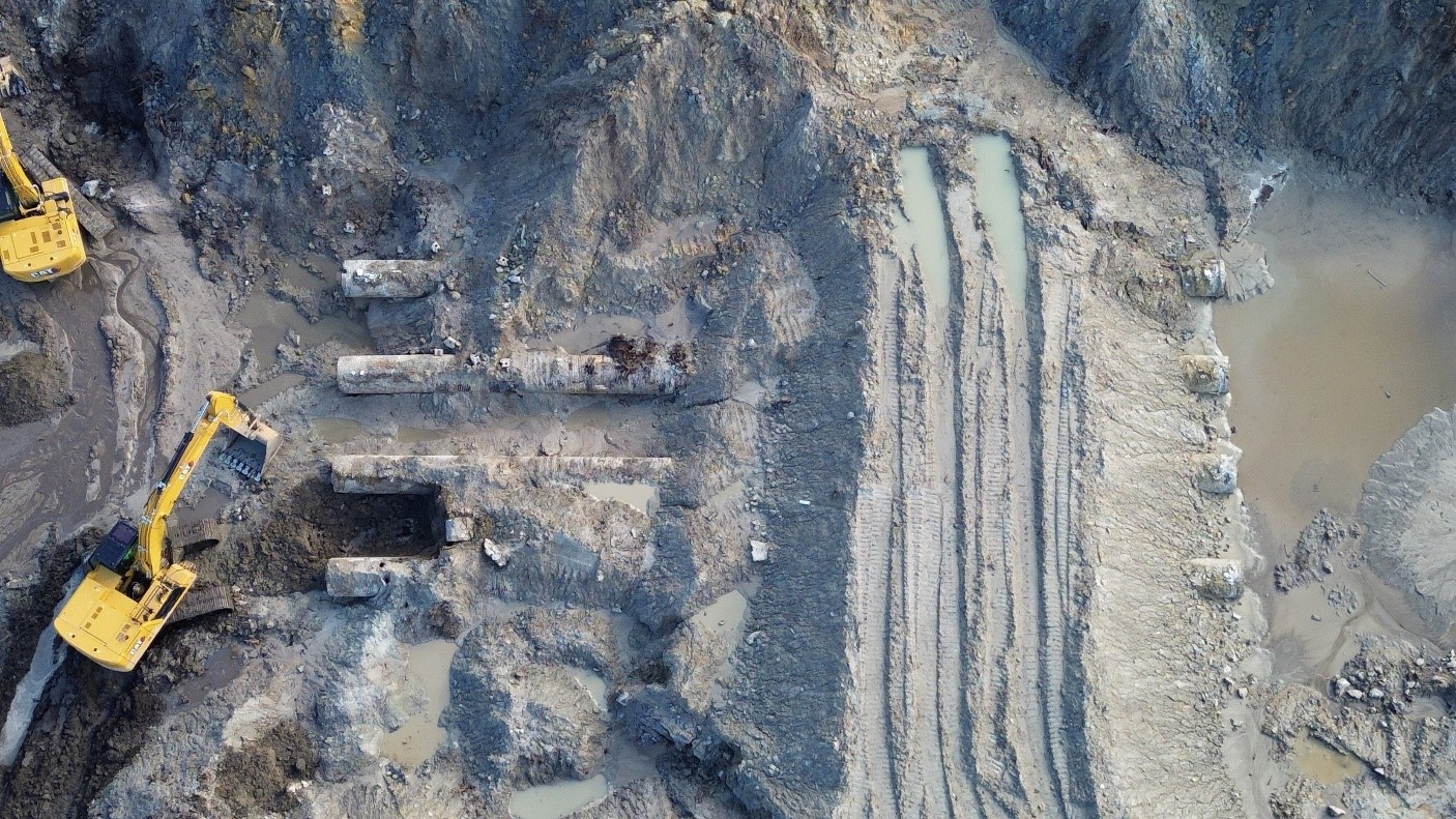 Excavating the spillway base