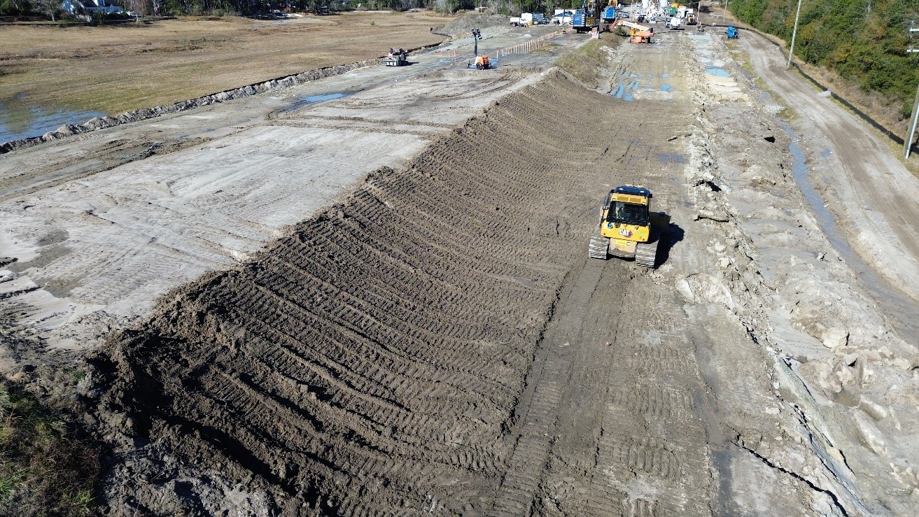 Dressing reels on the dam back slope after a rain event